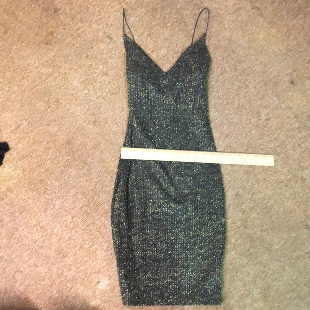 pre owned small black with gold sparkles dress